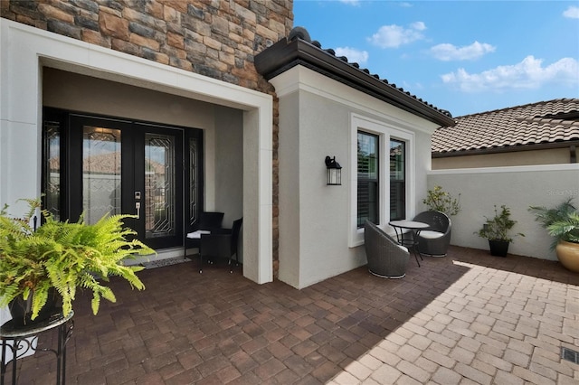 4795 Freccia Loop, Wesley Chapel, FL 33543 - view of patio / terrace featuring french doors