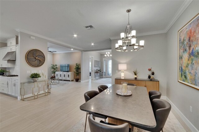 4795 Freccia Loop, Wesley Chapel, FL 33543 - dining space featuring a chandelier, ornamental molding, baseboards, and recessed lighting