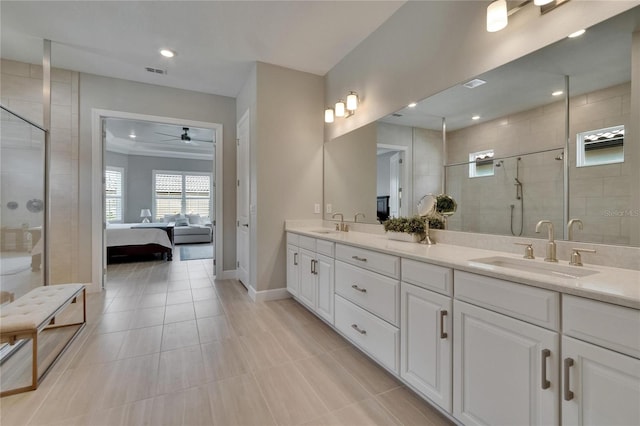 4795 Freccia Loop, Wesley Chapel, FL 33543 - full bath featuring connected bathroom, double vanity, a shower stall, a ceiling fan, and recessed lighting