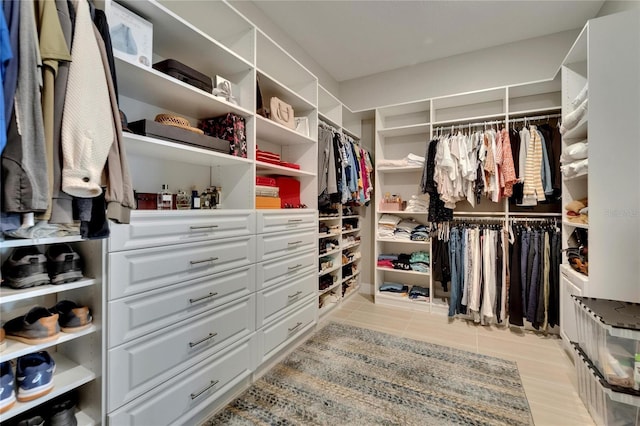 4795 Freccia Loop, Wesley Chapel, FL 33543 - spacious closet featuring light tile patterned flooring