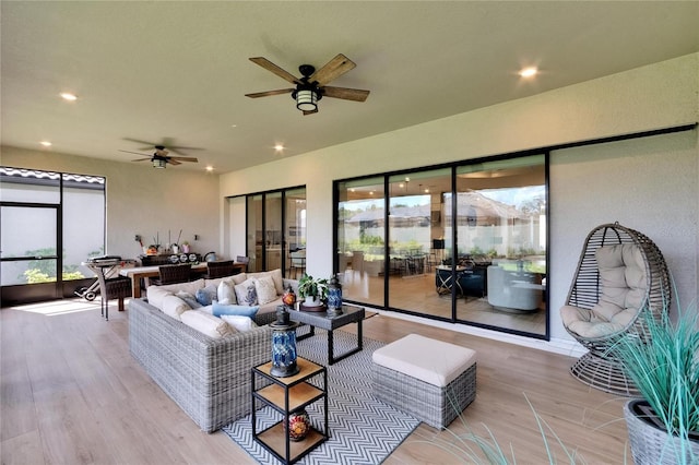 4795 Freccia Loop, Wesley Chapel, FL 33543 - living room with wood finished floors, ceiling fan, and recessed lighting