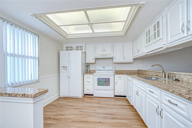 6550 Teak Ct, Zephyrhills, FL 33542 - kitchen featuring white appliances, under cabinet range hood, a sink, white cabinets, and glass insert cabinets