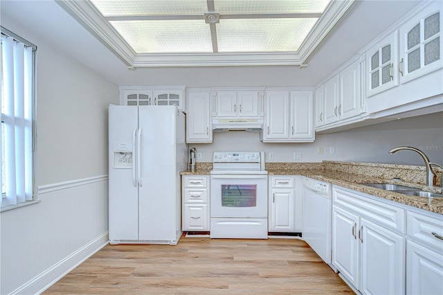 6550 Teak Ct, Zephyrhills, FL 33542 - kitchen with white appliances, a sink, white cabinetry, and under cabinet range hood