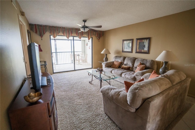 1846 Golfview Dr Unit 1846, Tarpon Springs, FL 34689 - living room featuring carpet, ceiling fan, and a textured ceiling