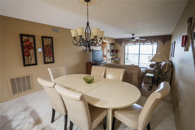 1846 Golfview Dr Unit 1846, Tarpon Springs, FL 34689 - dining area with a chandelier, a ceiling fan, and light tile patterned floors