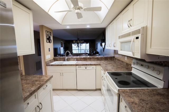 1846 Golfview Dr Unit 1846, Tarpon Springs, FL 34689 - kitchen featuring white appliances, a sink, recessed lighting, and white cabinets