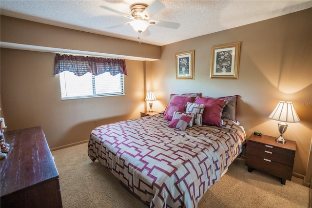 1846 Golfview Dr Unit 1846, Tarpon Springs, FL 34689 - bedroom with carpet, a ceiling fan, and a textured ceiling