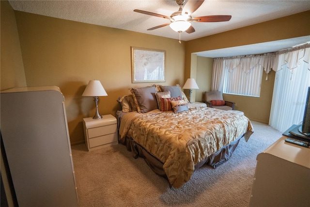 1846 Golfview Dr Unit 1846, Tarpon Springs, FL 34689 - bedroom with light colored carpet and a ceiling fan