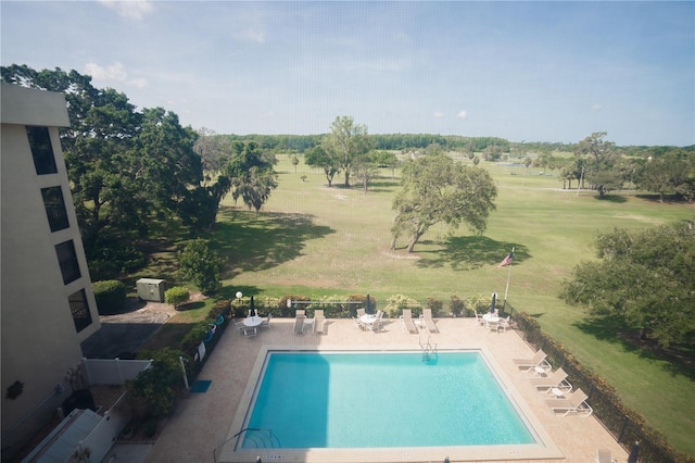 1846 Golfview Dr Unit 1846, Tarpon Springs, FL 34689 - community pool with a patio area and view of wooded area