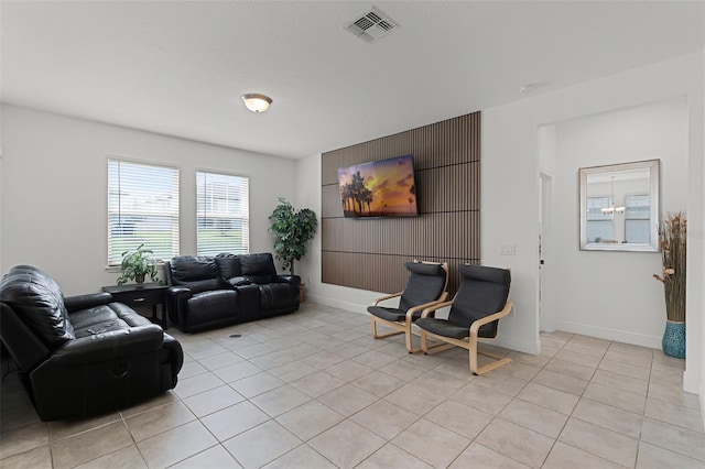 2296 Crossbow St, Clermont, FL 34715 - living area with light tile patterned flooring and baseboards