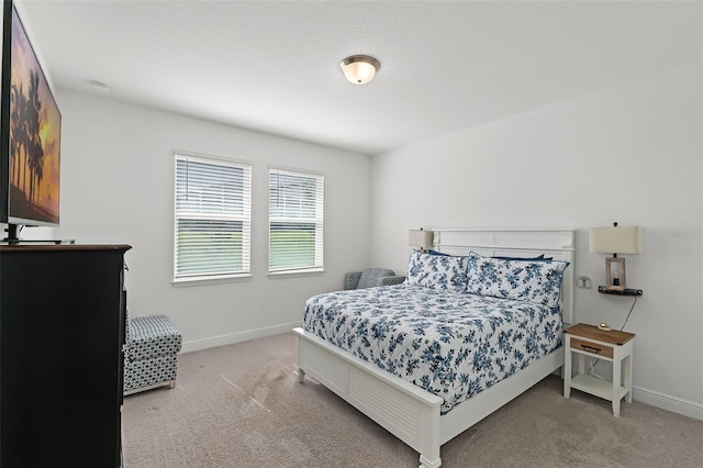 2296 Crossbow St, Clermont, FL 34715 - bedroom with light colored carpet and baseboards