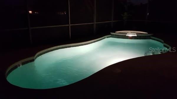 189 Minniehaha Cir, Haines City, FL 33844 - view of pool with a pool with connected hot tub