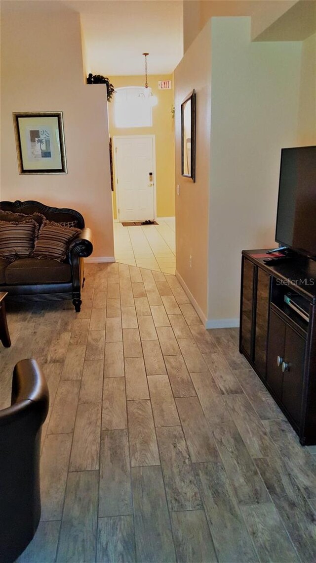 189 Minniehaha Cir, Haines City, FL 33844 - corridor featuring light wood-style flooring and baseboards