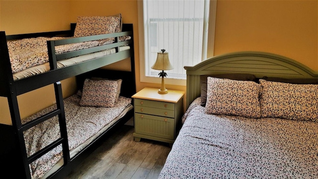 189 Minniehaha Cir, Haines City, FL 33844 - bedroom featuring wood finished floors and multiple windows