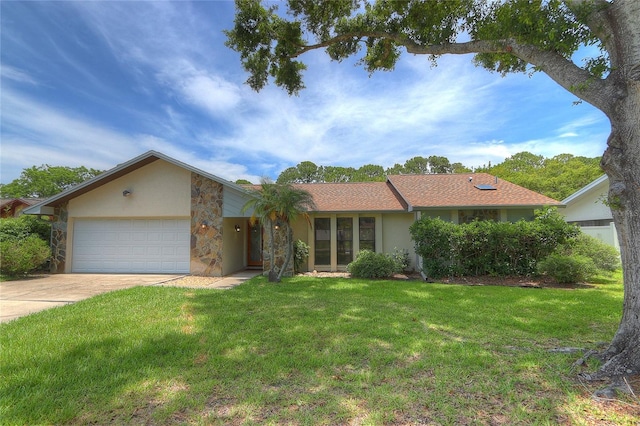 313 Oak Crest Dr, Safety Harbor, FL 34695 - single story home with a garage, stucco siding, a front lawn, and driveway