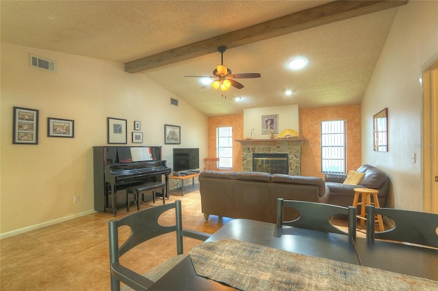 313 Oak Crest Dr, Safety Harbor, FL 34695 - living room with a ceiling fan, recessed lighting, a glass covered fireplace, baseboards, and a textured ceiling