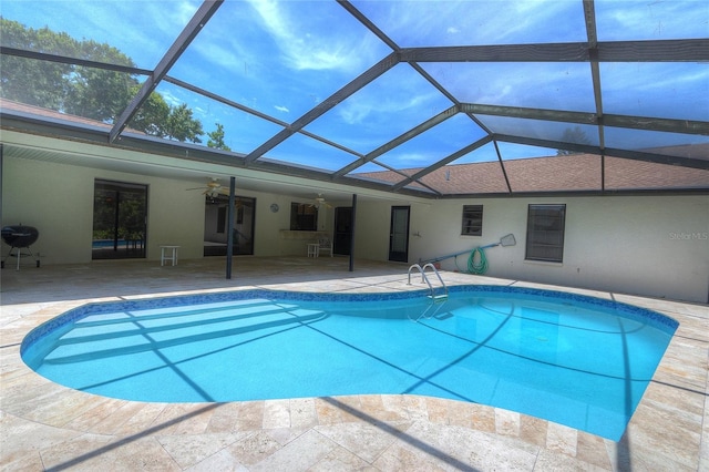 313 Oak Crest Dr, Safety Harbor, FL 34695 - swimming pool with a ceiling fan, a patio, and a lanai