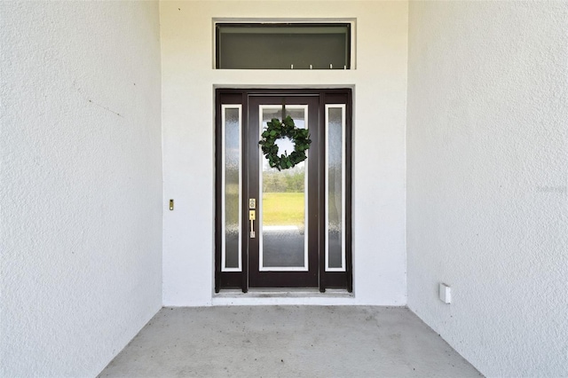 13334 Oldenburg Dr, Hudson, FL 34667 - property entrance featuring stucco siding