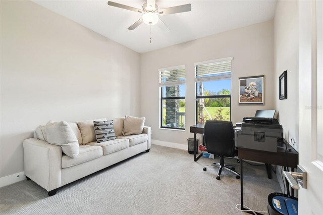 13334 Oldenburg Dr, Hudson, FL 34667 - office area with carpet floors, a ceiling fan, and baseboards