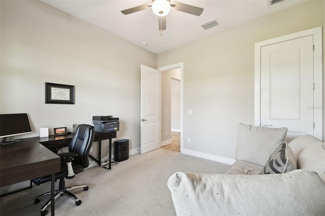 13334 Oldenburg Dr, Hudson, FL 34667 - office space featuring a ceiling fan, carpet floors, and baseboards