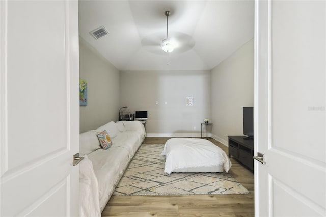 13334 Oldenburg Dr, Hudson, FL 34667 - bedroom featuring light wood-type flooring, vaulted ceiling, and a ceiling fan