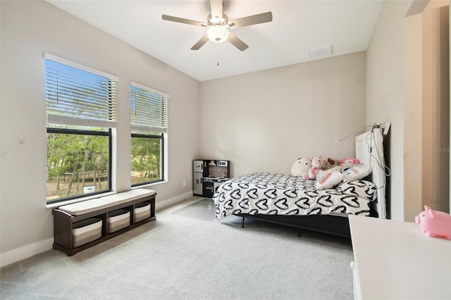 13334 Oldenburg Dr, Hudson, FL 34667 - bedroom with carpet, baseboards, and a ceiling fan