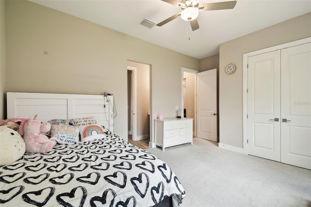 13334 Oldenburg Dr, Hudson, FL 34667 - bedroom with carpet floors, a closet, baseboards, and ceiling fan