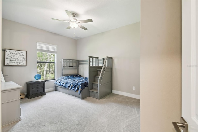 13334 Oldenburg Dr, Hudson, FL 34667 - bedroom featuring carpet flooring, baseboards, and ceiling fan