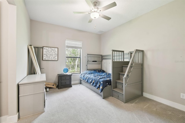 13334 Oldenburg Dr, Hudson, FL 34667 - bedroom with carpet floors, baseboards, and ceiling fan
