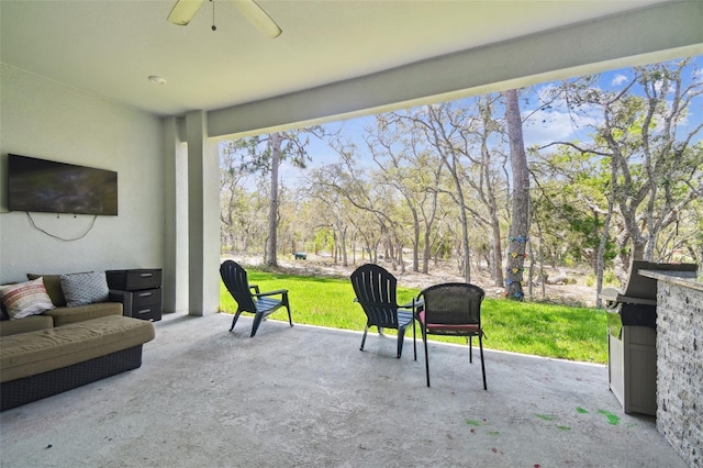13334 Oldenburg Dr, Hudson, FL 34667 - view of patio with a ceiling fan and view of scattered trees