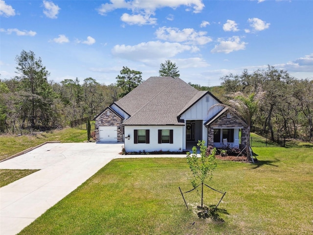 13334 Oldenburg Dr, Hudson, FL 34667 - view of front of property featuring concrete driveway, stone siding, a garage, and a front lawn