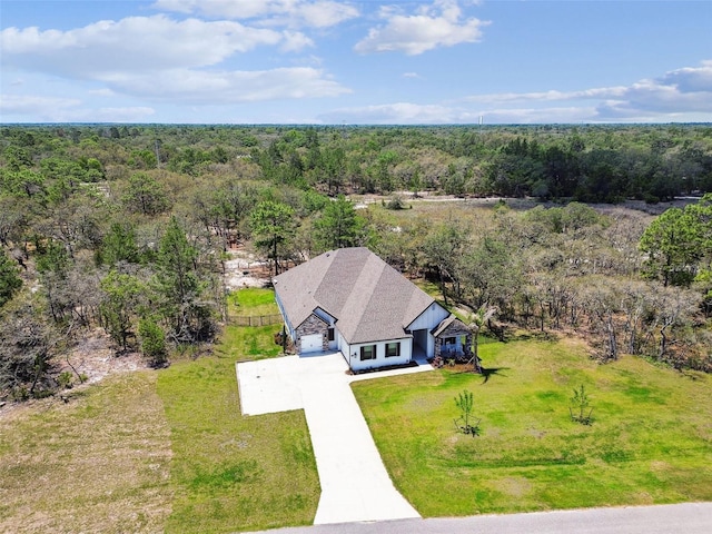13334 Oldenburg Dr, Hudson, FL 34667 - view of subject property with a heavily wooded area