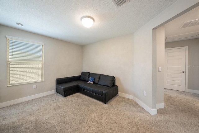 8719 Winning Fields Rd, New Port Richey, FL 34655 - unfurnished room featuring carpet floors, a textured ceiling, and baseboards
