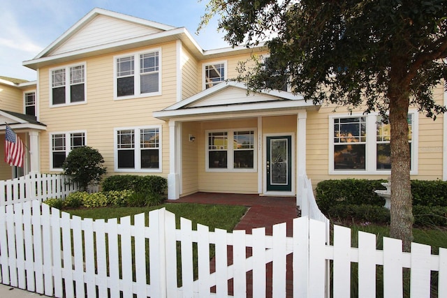 16137 Churchview Dr, Lithia, FL 33547 - multi unit property featuring a fenced front yard and a porch