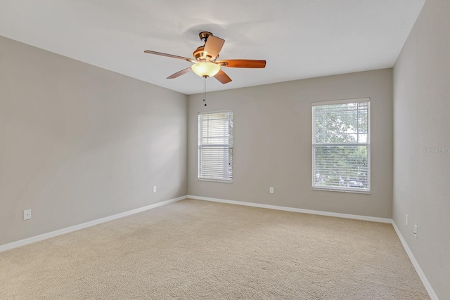 16137 Churchview Dr, Lithia, FL 33547 - spare room with ceiling fan, baseboards, and light colored carpet