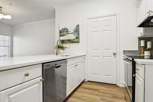 800 S Dakota Ave Unit 204, Tampa, FL 33606 - kitchen with stainless steel dishwasher, electric range, a sink, light wood-style flooring, and white cabinetry