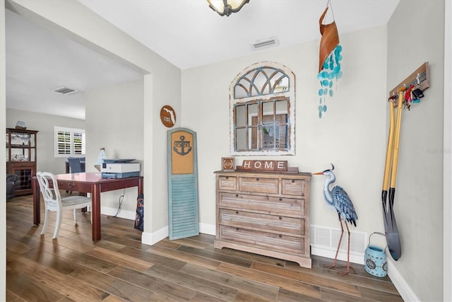 9591 Commodore Dr, Seminole, FL 33776 - foyer with baseboards and dark wood finished floors