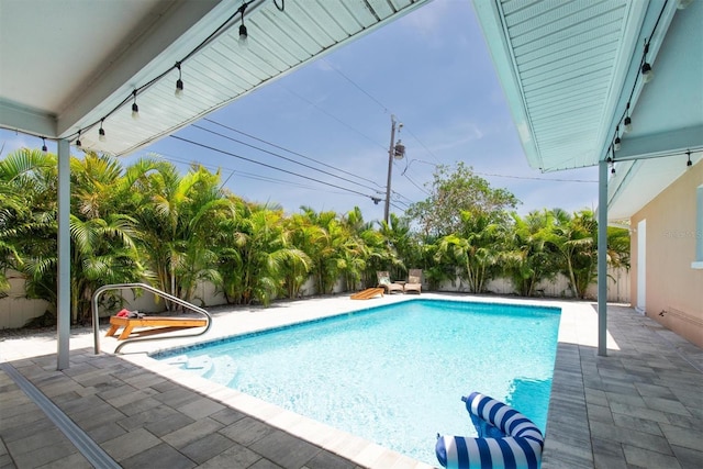 9591 Commodore Dr, Seminole, FL 33776 - view of pool with a patio and a fenced backyard