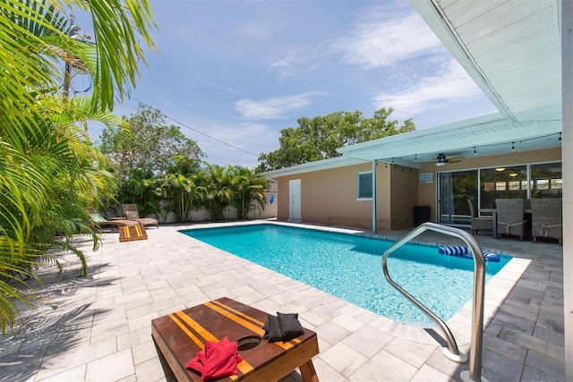 9591 Commodore Dr, Seminole, FL 33776 - view of swimming pool featuring a patio area and ceiling fan