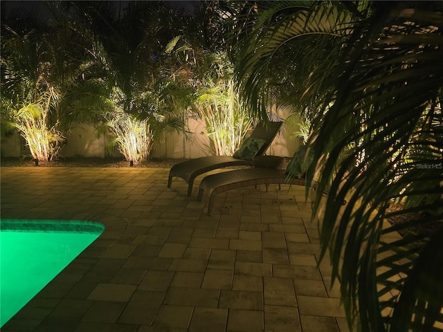 9591 Commodore Dr, Seminole, FL 33776 - view of property's community featuring a patio, a swimming pool, and a fenced backyard