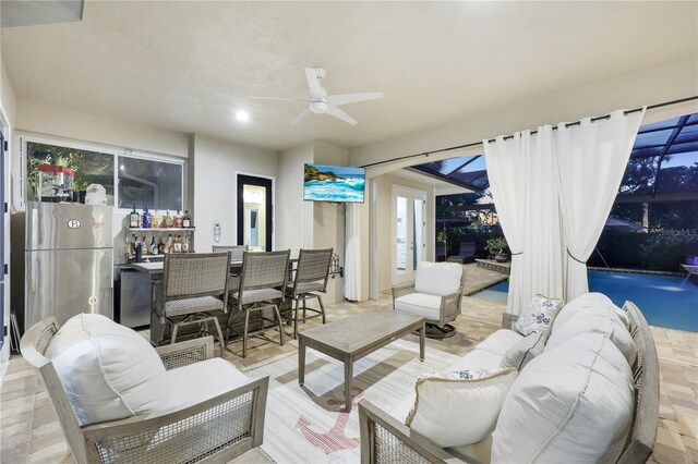 1817 Piccadilly Cir, Cape Coral, FL 33991 - living room with ceiling fan, recessed lighting, and bar area