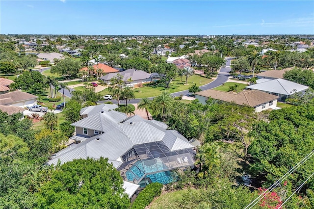 1817 Piccadilly Cir, Cape Coral, FL 33991 - aerial view of residential area featuring a tree filled landscape