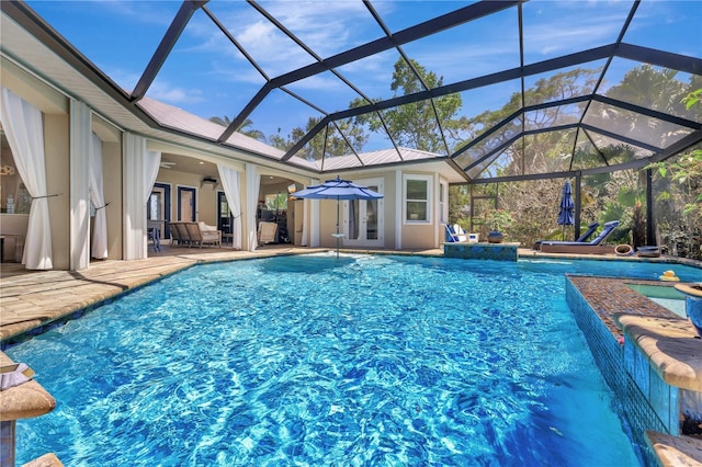 1817 Piccadilly Cir, Cape Coral, FL 33991 - outdoor pool with a patio area, a ceiling fan, a jacuzzi, french doors, and glass enclosure