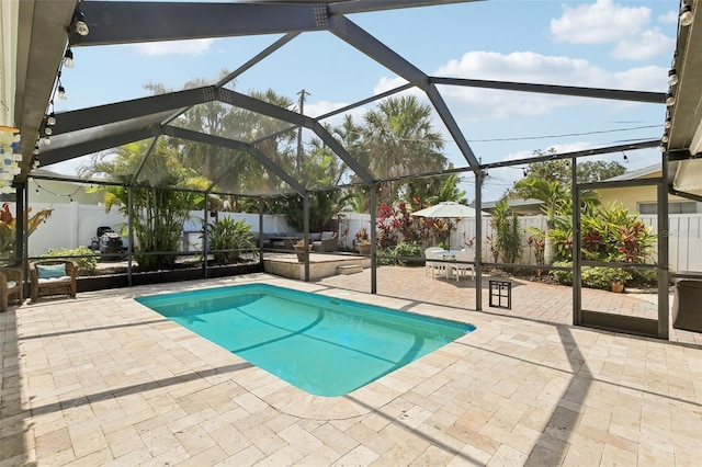 3966 High Bluff Dr, Largo, FL 33770 - view of swimming pool with a patio area, a fenced backyard, and a lanai