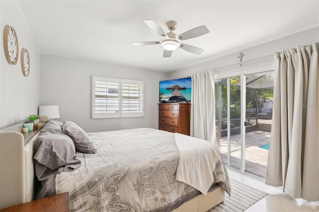 3966 High Bluff Dr, Largo, FL 33770 - bedroom with access to exterior and ceiling fan