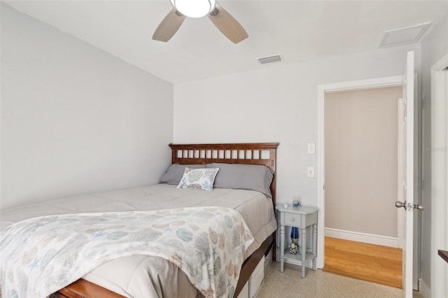 3966 High Bluff Dr, Largo, FL 33770 - bedroom with baseboards and a ceiling fan