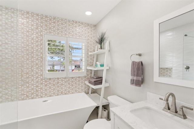 3966 High Bluff Dr, Largo, FL 33770 - bathroom featuring a freestanding tub, vanity, and toilet