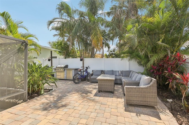 3966 High Bluff Dr, Largo, FL 33770 - fenced backyard featuring an outdoor living space, area for grilling, a patio area, and a lanai