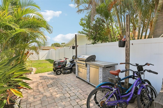 3966 High Bluff Dr, Largo, FL 33770 - fenced backyard with a patio area