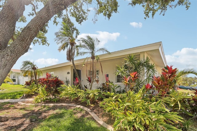 3966 High Bluff Dr, Largo, FL 33770 - view of front of house with stucco siding